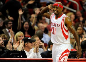 Houston Rockets guard Jason Terry celebrates a basket in the second half of an NBA basketball game against the Memphis Grizzlies, Wednesday, Dec. 3, 2014, in Houston. (AP Photo/Eric Christian Smith)