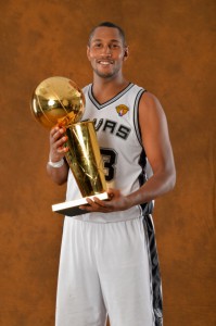 SAN ANTONIO, TX - JUNE 15: Boris Diaw #33 of the San Antonio Spurs poses for a portrait with the Larry O'Brien Trophy after defeating the Miami Heat in Game Five of the 2014 NBA Finals on June 15, 2014 at AT&T Center in San Antonio, Texas. NOTE TO USER: User expressly acknowledges and agrees that, by downloading and or using this photograph, User is consenting to the terms and conditions of the Getty Images License Agreement. Mandatory Copyright Notice: Copyright 2014 NBAE (Photo by Jesse D. Garrabrant/NBAE via Getty Images)