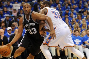 May 27, 2014; Oklahoma City, OK, USA; San Antonio Spurs forward Boris Diaw (33) handles the ball against Oklahoma City Thunder forward Kevin Durant (35) during the fourth quarter in game four of the Western Conference Finals of the 2014 NBA Playoffs at Chesapeake Energy Arena. Mandatory Credit: Mark D. Smith-USA TODAY Sports