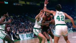 BOSTON - 1981:  Marques Johnson #8 of the Milwaukee Bucks drives to the basket against Kevin McHale #41 and Chris Ford #42 of the Boston Celtics during a game played in 1981 at the Boston Garden in Boston, Massachusetts. NOTE TO USER: User expressly acknowledges and agrees that, by downloading and or using this photograph, User is consenting to the terms and conditions of the Getty Images License Agreement. Mandatory Copyright Notice: Copyright 1981 NBAE (Photo by Dick Raphael/NBAE via Getty Images)