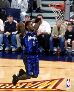 13 Dec 2001:  Guard Tracy McGrady #1 of the of the Orlando Magic dunks the ball during the NBA game against the Golden State Warriors at the Arena in Oakland in Oakland, California. The Magic defeated the Warriors 105-100. NOTE TO USER: User expressly acknowledges and agrees that, by downloading and/or using this Photograph, User is consenting to the terms and conditions of the Getty Images License Agreement. Mandatory copyright notice: Copyright 2001 NBA Mandatory Credit: Rocky Winder /Getty Images