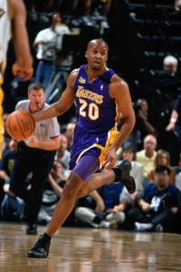 INDIANAPOLIS - JUNE 11:  Brian Shaw #20 of the Los Angeles Lakers moves the ball up court against the Indiana Pacers during Game Three of the 2000 NBA Finals on June 11, 2000 at Conseco Field House in Indianapolis, Indiana.  NOTE TO USER: User expressly acknowledges that, by downloading and or using this photograph, User is consenting to the terms and conditions of the Getty Images License agreement. Mandatory Copyright Notice: Copyright 2000 NBAE (Photo by Nathaniel S. Butler/NBAE via Getty Images)