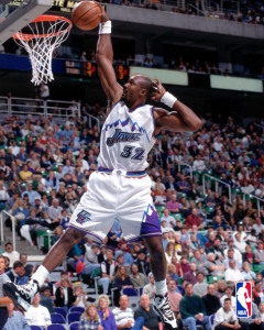 1997: Karl Malone #32 of the Utah Jazz goes for a dunk during the NBA game at the Delta Center in Salt Lake City, Utah. NOTE TO USER: User expressly acknowledges and agrees that, by downloading and/or using this Photograph, User is consenting to the terms and conditions of the Getty Images License Agreement. Mandatory copyright notice: Copyright 1997 NBAE Mandatory Credit: Norm Purdue /NBAE/Getty Images