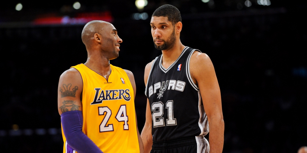 LOS ANGELES, CA - NOVEMBER 13: Tim Duncan #21 of the San Antonio Spurs and Kobe Bryant #24 of the Los Angeles Lakers share a laugh while playing on November 13, 2012 at the Staples Center in Los Angeles, California. NOTE TO USER: User expressly acknowledges and agrees that, by downloading and or using this photograph, user is consenting to the terms and conditions of the Getty Images License Agreement. Mandatory Copyright Notice: Copyright 2012 NBAE (Photo by Noah Graham/NBAE via Getty Images)