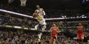Indiana Pacers forward Paul George (24) dunks during an NBA basketball game between the Indiana Pacers and the Los Angeles Clippers in Indianapolis, Saturday, Jan. 18, 2014. The Pacers won 106-92. (AP Photo/AJ Mast)