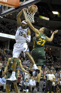 Dec 22, 2014; Memphis, TN, USA; Memphis Grizzlies guard Vince Carter (15) dunks over Utah Jazz center Rudy Gobert (27) during the game at FedExForum. Utah Jazz beat Memphis Grizzlies 97 -91.Mandatory Credit: Justin Ford-USA TODAY Sports