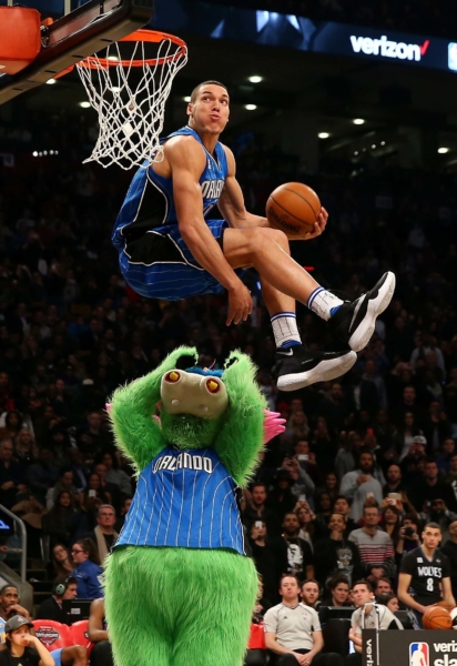TORONTO, ON - FEBRUARY 13: Aaron Gordon of the Orlando Magic dunks over Stuff the Orlando Magic mascot in the Verizon Slam Dunk Contest during NBA All-Star Weekend 2016 at Air Canada Centre on February 13, 2016 in Toronto, Canada. NOTE TO USER: User expressly acknowledges and agrees that, by downloading and/or using this Photograph, user is consenting to the terms and conditions of the Getty Images License Agreement. (Photo by Elsa/Getty Images)