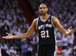 MIAMI, FL - JUNE 06:  Tim Duncan #21 of the San Antonio Spurs reacts after picking up his third foul in the third quarter against the Miami Heat during Game One of the 2013 NBA Finals at AmericanAirlines Arena on June 6, 2013 in Miami, Florida. NOTE TO USER: User expressly acknowledges and agrees that, by downloading and or using this photograph, User is consenting to the terms and conditions of the Getty Images License Agreement.  (Photo by Mike Ehrmann/Getty Images)