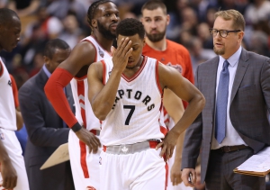 TORONTO, CANADA - APRIL 16: Kyle Lowry #7 of the Toronto Raptors reacts during their game against the Indiana Pacers in Game One of the Eastern Conference Quarterfinals during the 2016 NBA Playoffs on April 16, 2016 at the Air Canada Centre in Toronto, Ontario, Canada. (Photo by Tom Szczerbowski/Getty Images) ORG XMIT: 629953639 ORIG FILE ID: 521583902