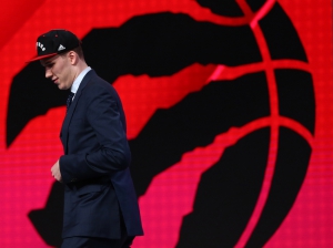 Jun 23, 2016; New York, NY, USA; Jakob Poeltl (Utah) walks off stage after being selected as the number nine overall pick to the Toronto Raptors in the first round of the 2016 NBA Draft at Barclays Center. Mandatory Credit: Jerry Lai-USA TODAY Sports
