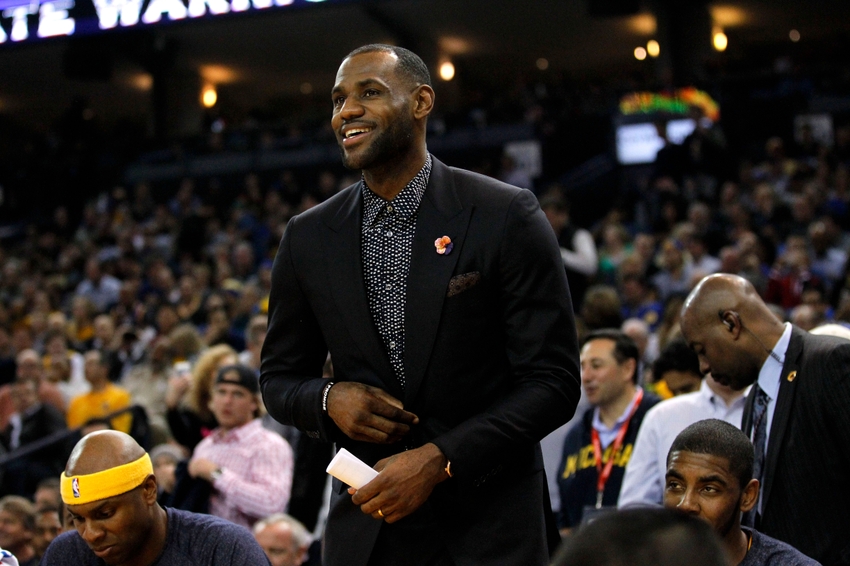Jan 9, 2015; Oakland, CA, USA; Cleveland Cavaliers forward LeBron James (23) stands near the team bench during a timeout against the Golden State Warriors in the second quarter at Oracle Arena. Mandatory Credit: Cary Edmondson-USA TODAY Sports