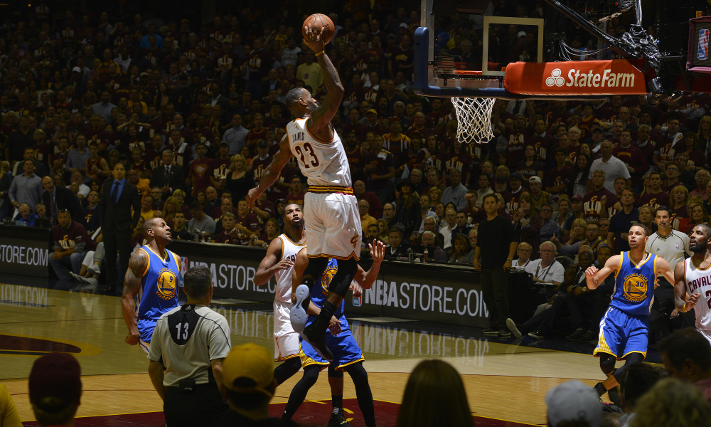 CLEVELAND, OH - JUNE 8: LeBron James #23 of the Cleveland Cavaliers goes up for a dunk against the Golden State Warriors against the Golden State Warriors in Game Three of the 2016 NBA Finals on June 8, 2016 at Quicken Loans Arena in Cleveland, Ohio. NOTE TO USER: User expressly acknowledges and agrees that, by downloading and/or using this Photograph, user is consenting to the terms and conditions of the Getty Images License Agreement. Mandatory Copyright Notice: Copyright 2016 NBAE (Photo by Jesse D. Garrabrant/NBAE via Getty Images) ORG XMIT: 643779439 [Via MerlinFTP Drop]