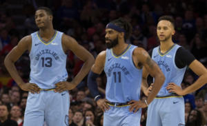 Da sinistra, Jaren Jackson Jr., Mike Conley e Kyle Anderson