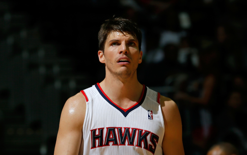 ATLANTA, GA - DECEMBER 06: Kyle Korver #26 of the Atlanta Hawks walks back on the court against the Cleveland Cavaliers after setting an NBA record by making a 3-pointer in his 90th straight game at Philips Arena on December 6, 2013 in Atlanta, Georgia. NOTE TO USER: User expressly acknowledges and agrees that, by downloading and or using this photograph, User is consenting to the terms and conditions of the Getty Images License Agreement. (Photo by Kevin C. Cox/Getty Images)