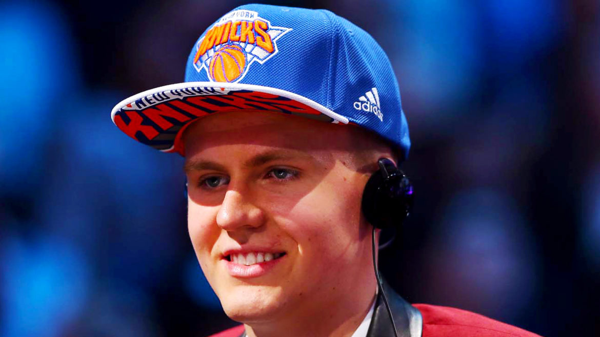 NEW YORK, NY - JUNE 25: Kristaps Porzingis speaks to the media after being selected fourth overall by the New York Knicks in the First Round of the 2015 NBA Draft at the Barclays Center on June 25, 2015 in the Brooklyn borough of New York City. NOTE TO USER: User expressly acknowledges and agrees that, by downloading and or using this photograph, User is consenting to the terms and conditions of the Getty Images License Agreement. (Photo by Elsa/Getty Images)