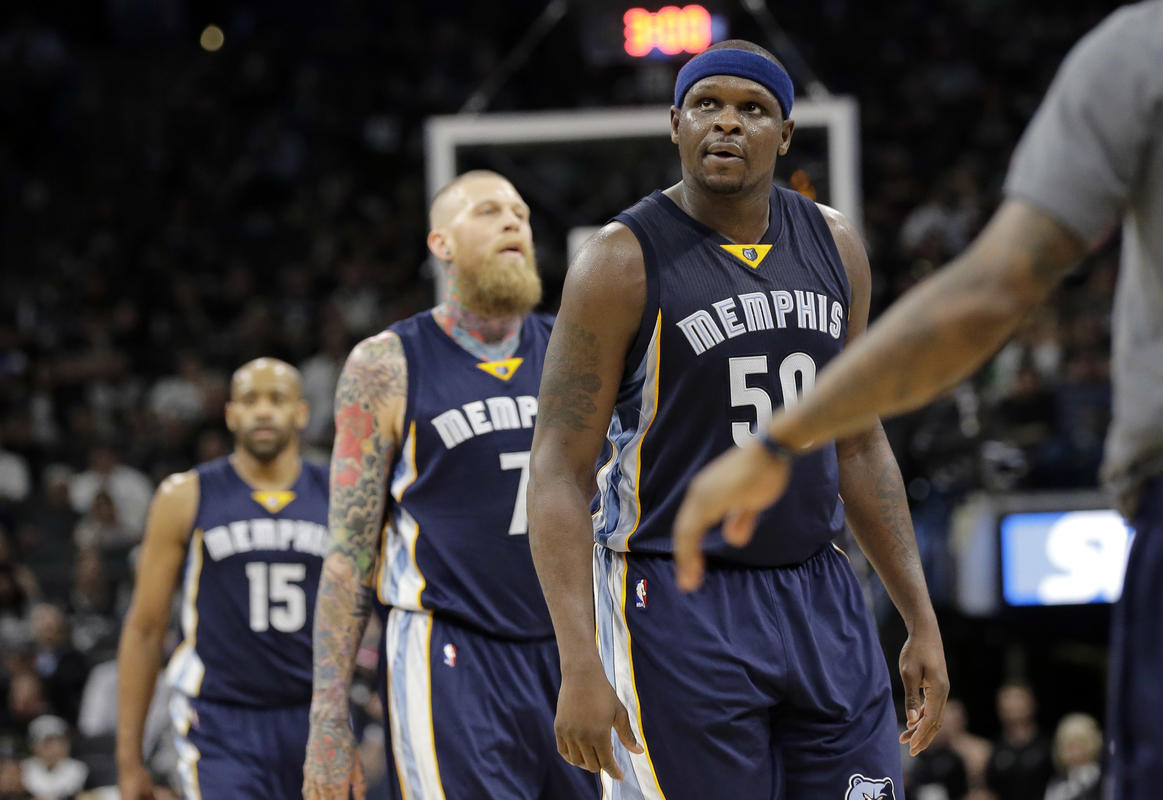 CORRECTS TO SECOND HALF - Memphis Grizzlies forward Zach Randolph (50), forward Chris Andersen (7) and guard Vince Carter (15) walk off the court during a timeout in the second half in Game 2 of a first-round NBA basketball playoff series, Tuesday, April 19, 2016, in San Antonio. (AP Photo/Eric Gay)