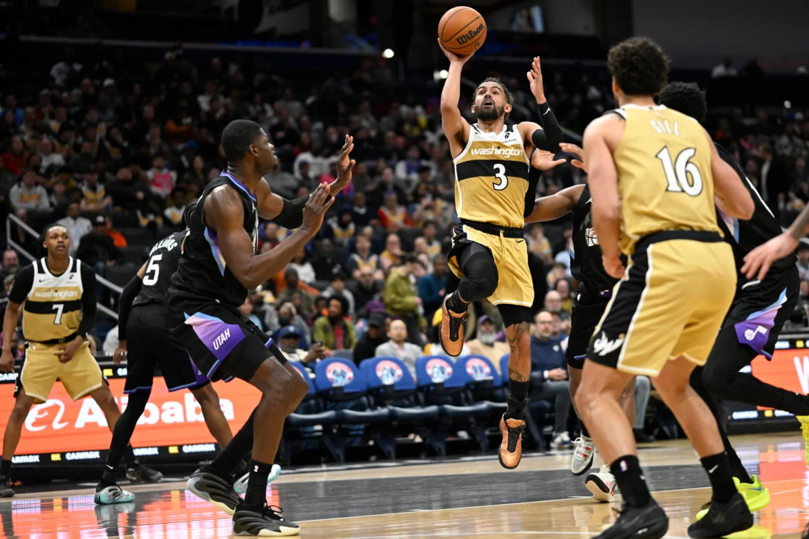 trae young esordio wizards